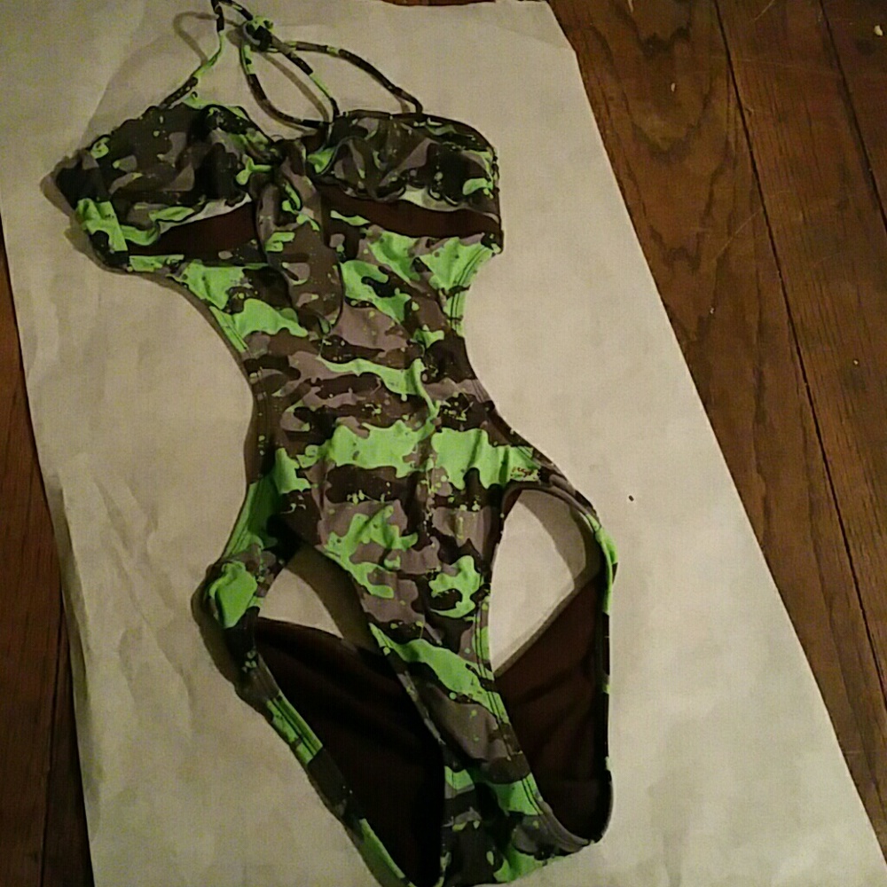 Women's one piece backless swim suit.